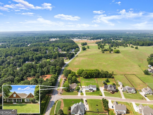 25 Wicklow Ct, Hoschton, GA 30548 - aerial view of property and surrounding area with property parcel outlined and a heavily wooded area