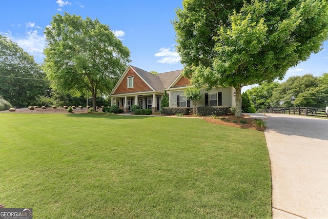 25 Wicklow Ct, Hoschton, GA 30548 - craftsman inspired home featuring a porch and concrete driveway