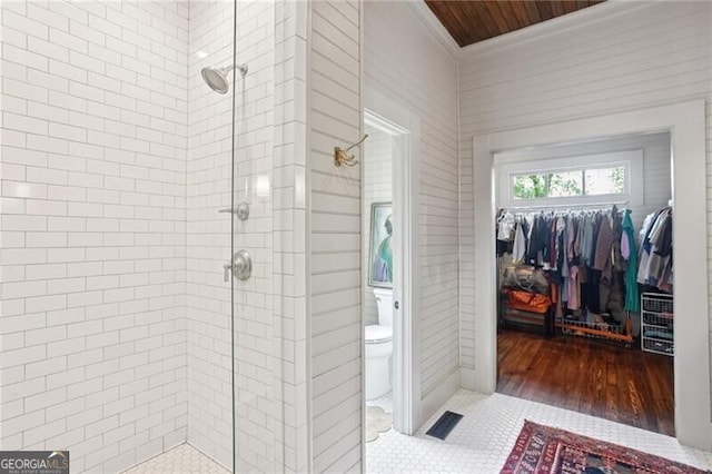 27 Sessions St NW, Marietta, GA 30060 - full bathroom with a shower stall, toilet, crown molding, and a walk in closet