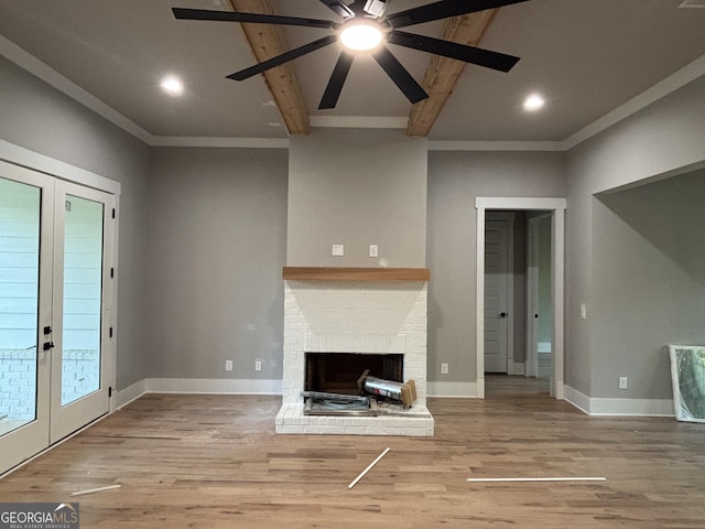 5680 Mack Way, Gainesville, GA 30506 - unfurnished living room featuring beam ceiling, french doors, a ceiling fan, wood finished floors, and recessed lighting