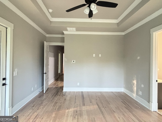 5680 Mack Way, Gainesville, GA 30506 - spare room with a tray ceiling, ceiling fan, light wood-style flooring, crown molding, and a smoke detector