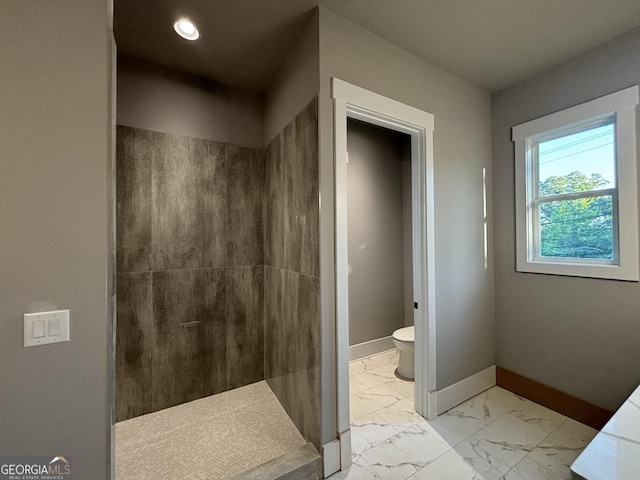 5680 Mack Way, Gainesville, GA 30506 - bathroom with marble look tile flooring, tiled shower, and recessed lighting