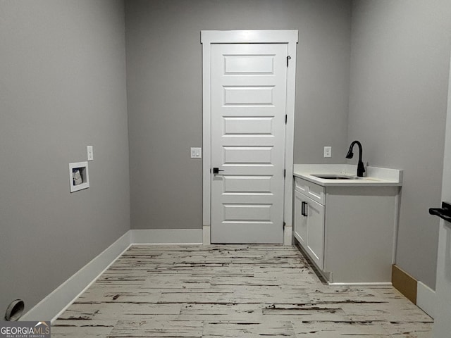 5680 Mack Way, Gainesville, GA 30506 - laundry area with cabinet space, washer hookup, and light wood-style flooring