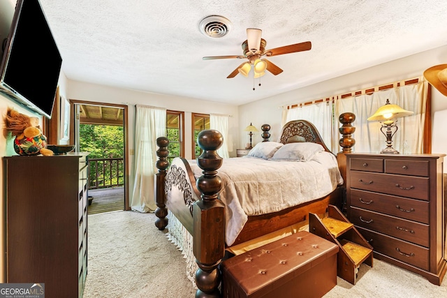 367 Woodbrier, Sautee Nacoochee, GA 30571 - bedroom featuring light colored carpet, access to exterior, a textured ceiling, and a ceiling fan