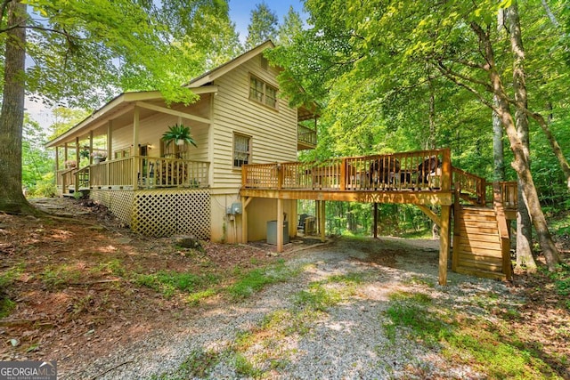 367 Woodbrier, Sautee Nacoochee, GA 30571 - view of side of home with stairs, dirt driveway, and a wooden deck