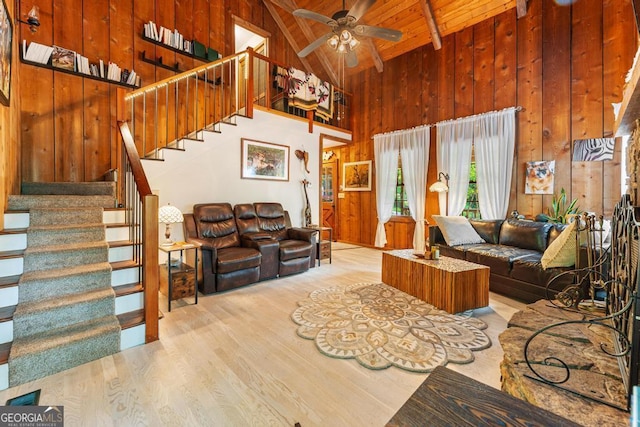 367 Woodbrier, Sautee Nacoochee, GA 30571 - living area with wooden walls, high vaulted ceiling, wood finished floors, a ceiling fan, and stairway