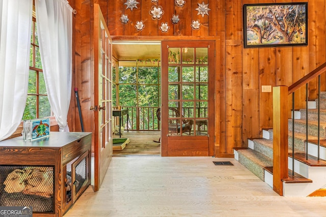 367 Woodbrier, Sautee Nacoochee, GA 30571 - entryway with stairs, wooden walls, wood finished floors, and french doors