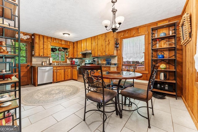 367 Woodbrier, Sautee Nacoochee, GA 30571 - dining room with wood walls, a textured ceiling, light tile patterned floors, and a chandelier