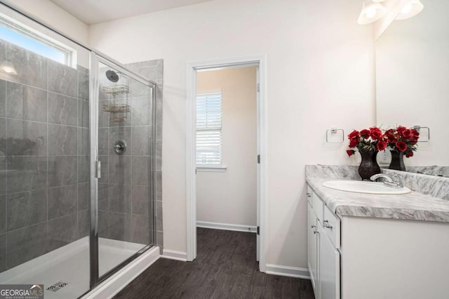 113 Waterside Dr, Calhoun, GA 30701 - full bathroom with vanity, a stall shower, plenty of natural light, and wood finished floors