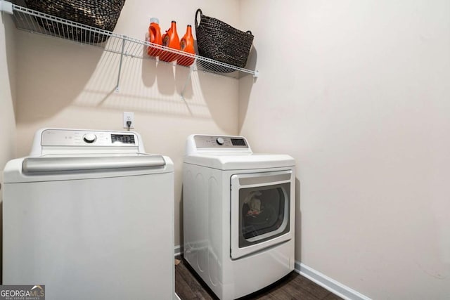 113 Waterside Dr, Calhoun, GA 30701 - laundry room featuring washing machine and clothes dryer, baseboards, and dark wood-style flooring