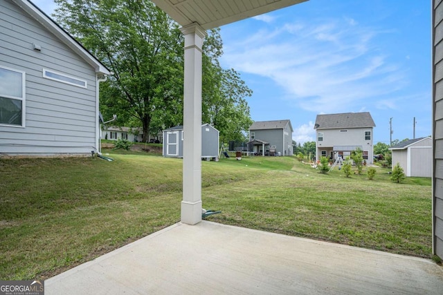 113 Waterside Dr, Calhoun, GA 30701 - view of grassy yard featuring a patio and a residential view