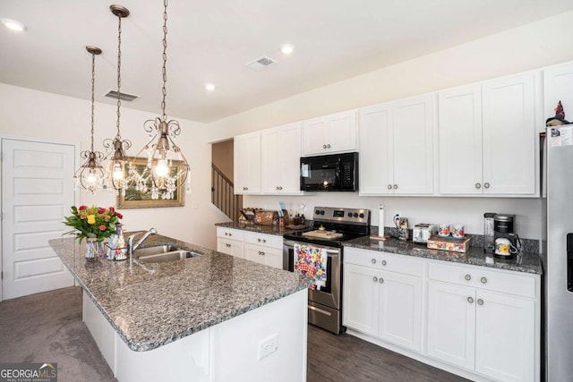113 Waterside Dr, Calhoun, GA 30701 - kitchen featuring appliances with stainless steel finishes, a sink, white cabinetry, a kitchen island with sink, and recessed lighting