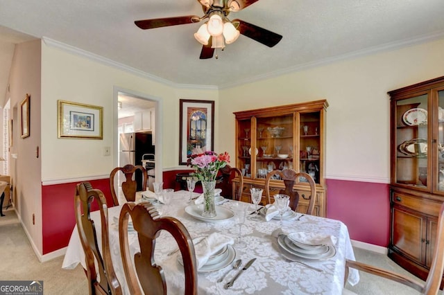 1818 Mcconnell Rd, Grayson, GA 30017 - dining area featuring light colored carpet, ceiling fan, ornamental molding, and baseboards