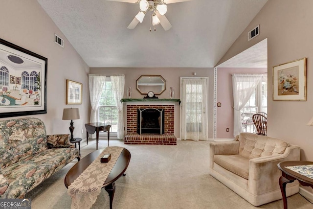 1818 Mcconnell Rd, Grayson, GA 30017 - carpeted living room with vaulted ceiling, a ceiling fan, a fireplace, and baseboards