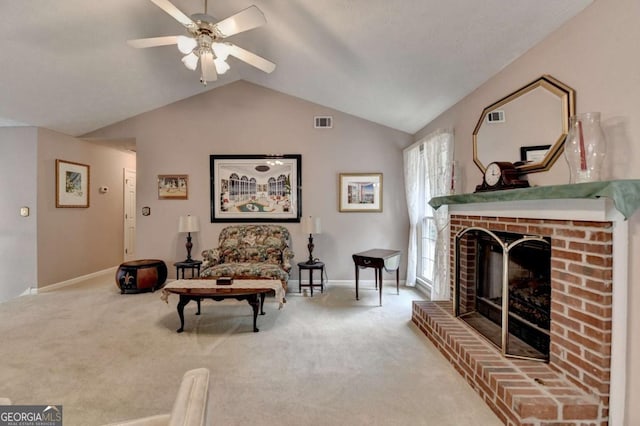 1818 Mcconnell Rd, Grayson, GA 30017 - living area featuring vaulted ceiling, ceiling fan, baseboards, a fireplace, and carpet