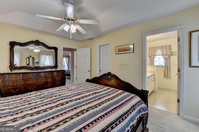 1818 Mcconnell Rd, Grayson, GA 30017 - bedroom with light colored carpet, connected bathroom, baseboards, and ceiling fan
