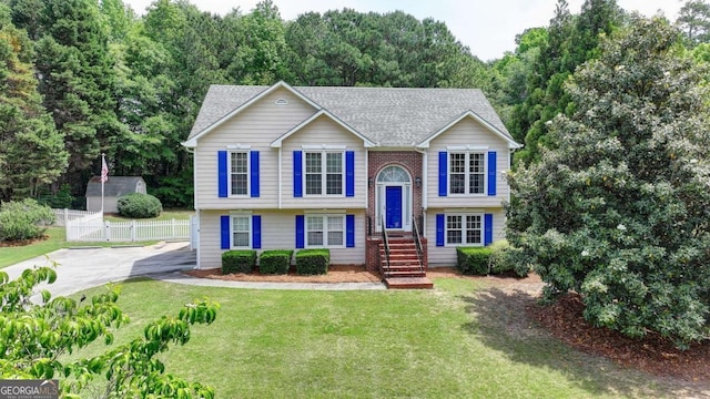 1818 Mcconnell Rd, Grayson, GA 30017 - raised ranch featuring a shingled roof