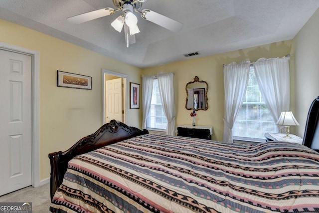 1818 Mcconnell Rd, Grayson, GA 30017 - carpeted bedroom with a raised ceiling and ceiling fan