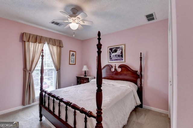 1818 Mcconnell Rd, Grayson, GA 30017 - bedroom featuring light colored carpet, baseboards, ceiling fan, and a textured ceiling