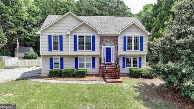 1818 Mcconnell Rd, Grayson, GA 30017 - raised ranch featuring a shingled roof