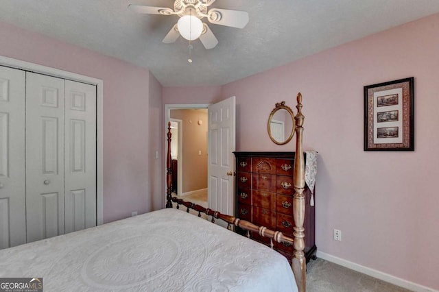 1818 Mcconnell Rd, Grayson, GA 30017 - carpeted bedroom featuring a closet, baseboards, and ceiling fan