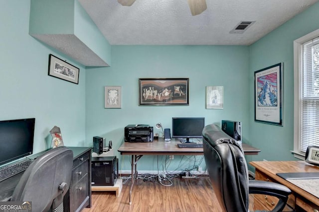 1818 Mcconnell Rd, Grayson, GA 30017 - office area with a ceiling fan, wood finished floors, plenty of natural light, and a textured ceiling