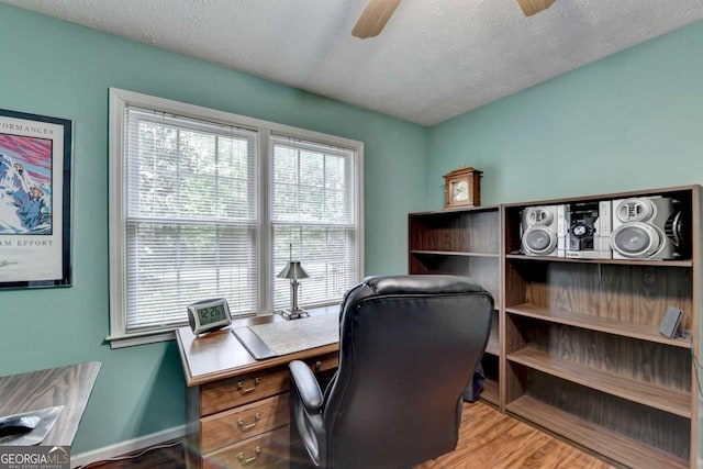 1818 Mcconnell Rd, Grayson, GA 30017 - office area with a ceiling fan, a textured ceiling, wood finished floors, and baseboards