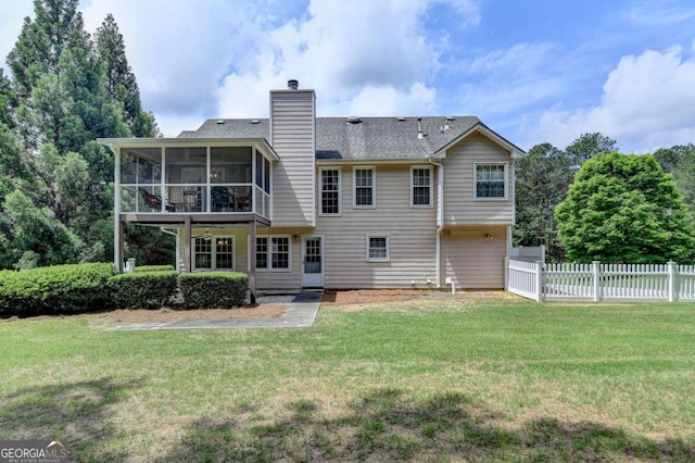 1818 Mcconnell Rd, Grayson, GA 30017 - rear view of house featuring a sunroom and a chimney