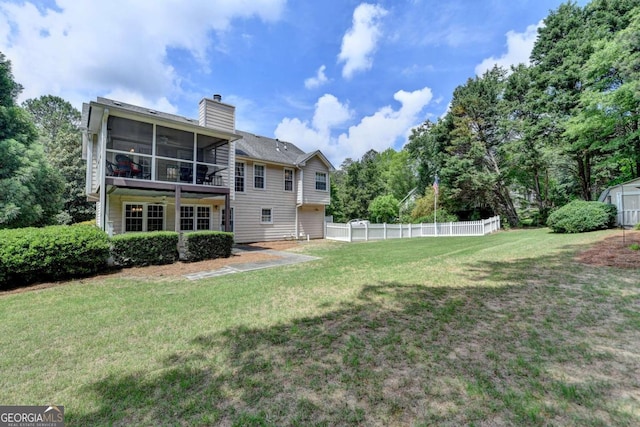 1818 Mcconnell Rd, Grayson, GA 30017 - back of property with a sunroom and a chimney