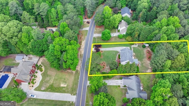 1818 Mcconnell Rd, Grayson, GA 30017 - aerial perspective of suburban area featuring a forest