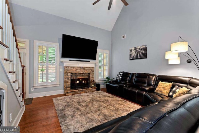 1132 Ivey Brook Dr, Bethlehem, GA 30620 - living area with ceiling fan, wood finished floors, healthy amount of natural light, stairway, and high vaulted ceiling
