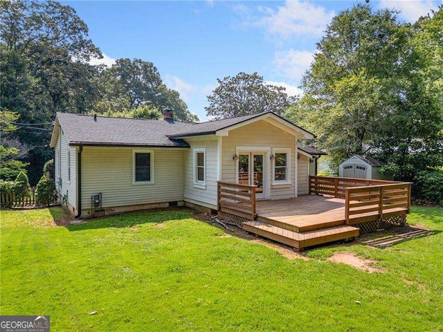 3274 Ridgecrest Rd SE, Smyrna, GA 30080 - rear view of house with a deck and a lawn