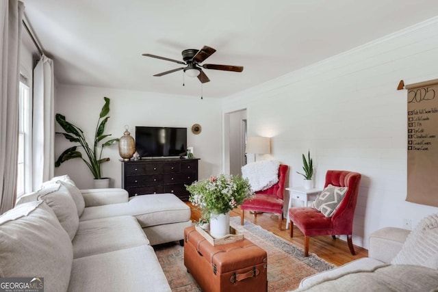 980 Oglethorpe Ave, Athens, GA 30606 - living room featuring wood finished floors, ceiling fan, and crown molding