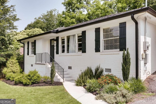 980 Oglethorpe Ave, Athens, GA 30606 - view of front facade with brick siding and a front yard