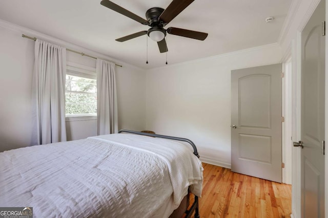 980 Oglethorpe Ave, Athens, GA 30606 - bedroom featuring light wood-style floors, crown molding, and ceiling fan