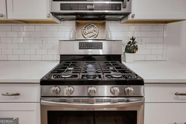 980 Oglethorpe Ave, Athens, GA 30606 - kitchen view of appliances with stainless steel finishes, light countertops, and white cabinets