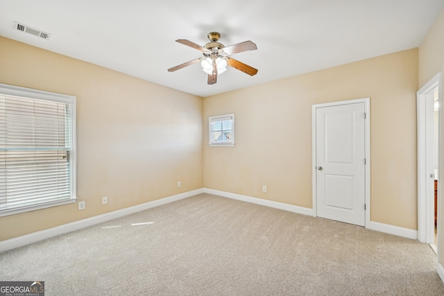 189 Privet Cir, Suwanee, GA 30024 - unfurnished bedroom with carpet, baseboards, and ceiling fan