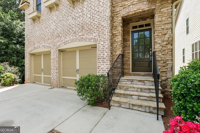 189 Privet Cir, Suwanee, GA 30024 - entrance to property featuring concrete driveway and brick siding