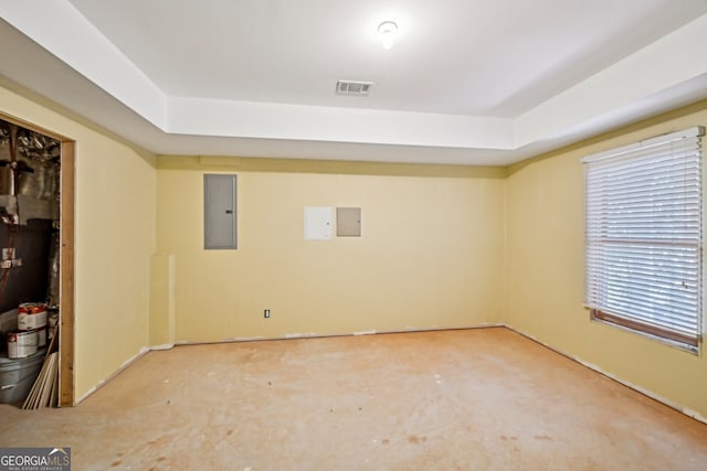 189 Privet Cir, Suwanee, GA 30024 - unfurnished room featuring electric panel and a tray ceiling