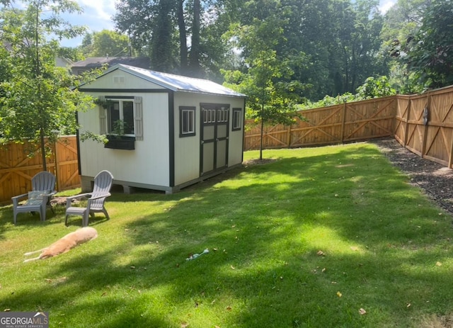 308 Reed St, Scottdale, GA 30079 - view of shed with a fenced backyard