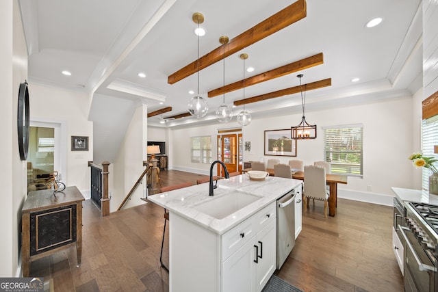 308 Reed St, Scottdale, GA 30079 - kitchen with stainless steel appliances, dark wood-style floors, light stone countertops, recessed lighting, and beamed ceiling