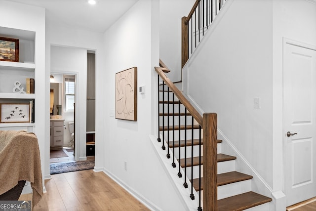 6045 Stargazer Way, Cumming, GA 30028 - stairway featuring wood finished floors, baseboards, and recessed lighting