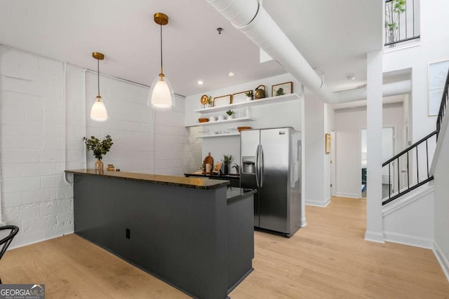 820 Dekalb Ave NE Unit 2, Atlanta, GA 30307 - kitchen featuring stainless steel fridge with ice dispenser, a peninsula, open shelves, light wood-type flooring, and recessed lighting