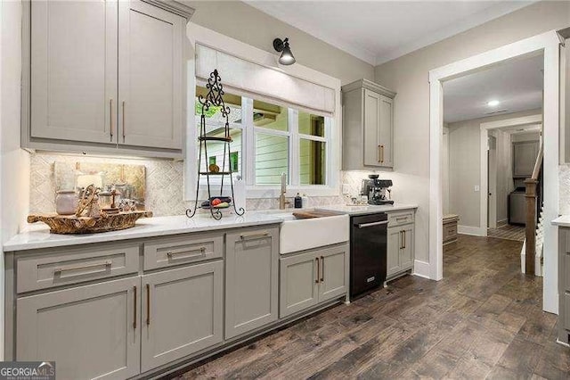 131 Forsyth Park Ln, Woodstock, GA 30188 - kitchen featuring gray cabinets, tasteful backsplash, dark wood finished floors, light countertops, and crown molding