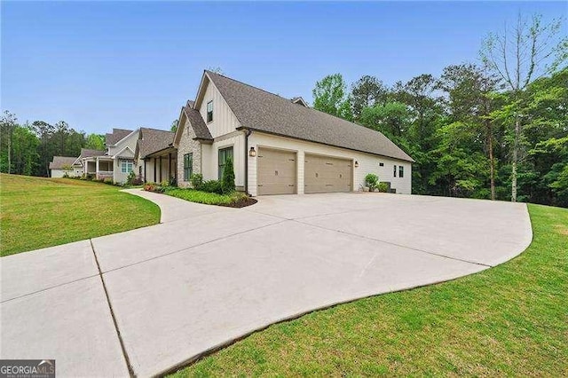 131 Forsyth Park Ln, Woodstock, GA 30188 - view of side of home with concrete driveway, an attached garage, and a lawn