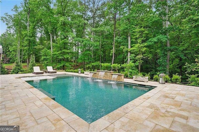 131 Forsyth Park Ln, Woodstock, GA 30188 - swimming pool featuring a patio