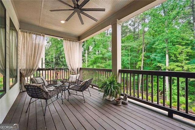 131 Forsyth Park Ln, Woodstock, GA 30188 - deck with a ceiling fan and an outdoor hangout area