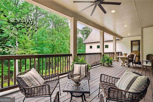 131 Forsyth Park Ln, Woodstock, GA 30188 - deck featuring a ceiling fan and outdoor lounge area