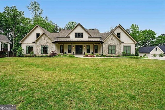 131 Forsyth Park Ln, Woodstock, GA 30188 - view of front of property featuring board and batten siding and a front yard
