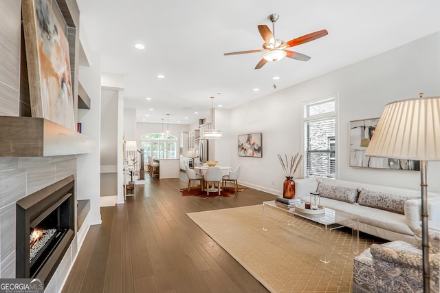 4202 Deming Cir, Sandy Springs, GA 30342 - living room featuring ceiling fan, a tile fireplace, recessed lighting, and dark wood finished floors